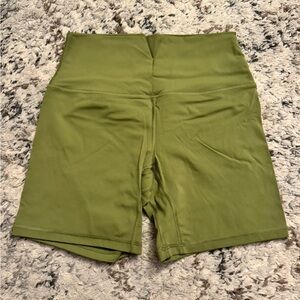 Green Athletic Shorts with Smooth Stretchy Fabric and Wide Waistband